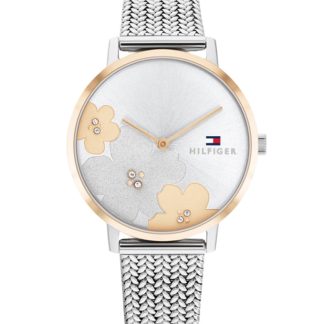 TOMMY HILFIGER Classic Damenuhr mit Bicolor-Akzenten, silbernem Zifferblatt mit verspieltem Blütenmuster und filigranem Milanaise-Armband.